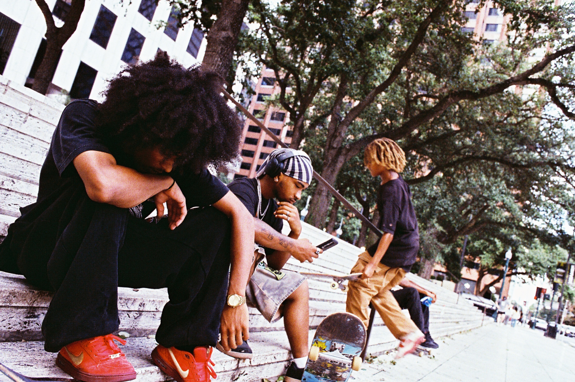 Street Star crew seated on steps