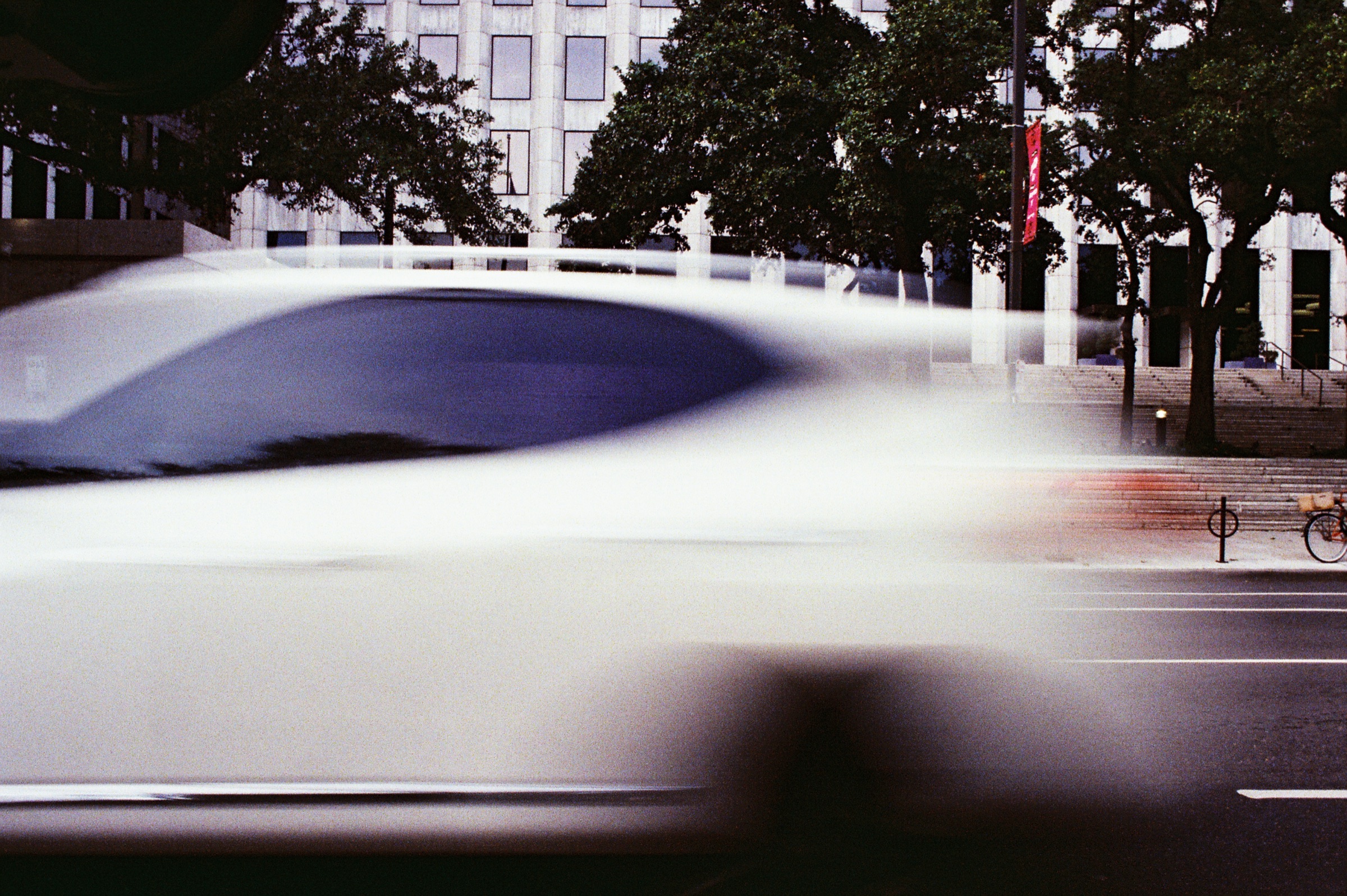 Street Star skater seen through passing street motion